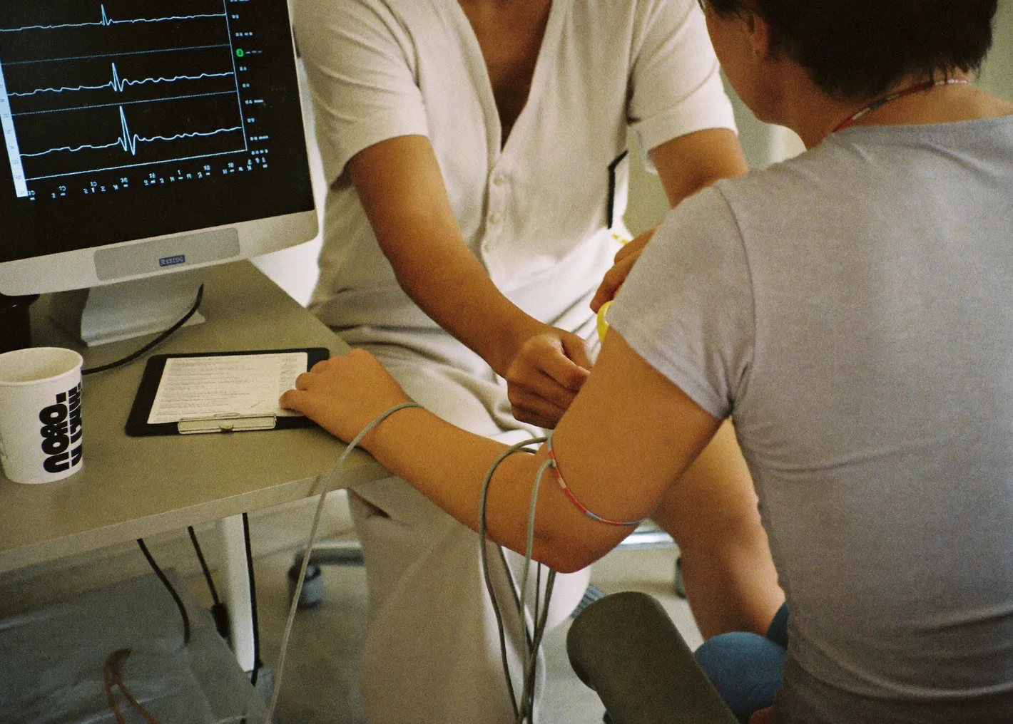 A crew member having sensors fitted at the Apogee clinic